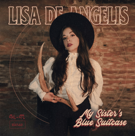 DARK AMERICANA ARTIST LISA DE ANGELIS RELEASES SINGLE AND MUSIC VIDEO “MY SISTERS BLUE SUITCASE” Alt-Country Musician Spotlights Overcoming Personal Challenges